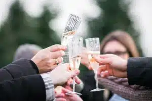 people toasting with champagne flutes