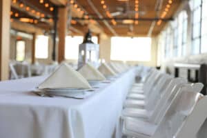 white formal seating at a long table