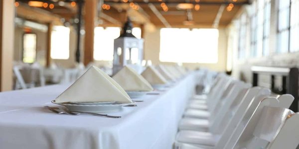white formal seating at a long table