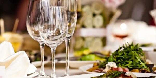 wine glasses and champagne flutes at a table